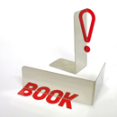 set of 2 bookends made of polished stainless steel. clever use of a mirror effect reveals the word BOOK ! when viewed at an angle
